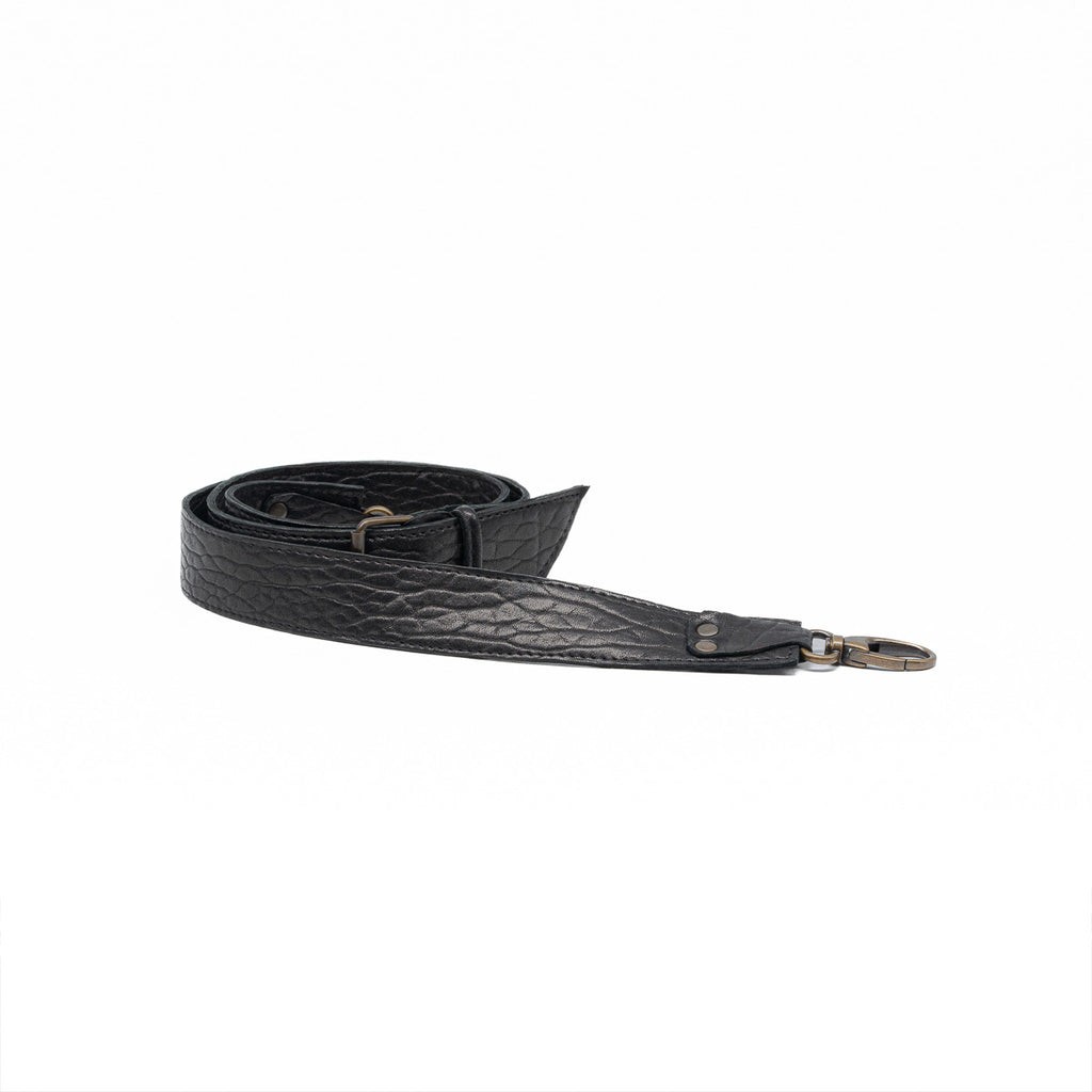 Anse bandoulière bubble noir — détail du cuir bubble
